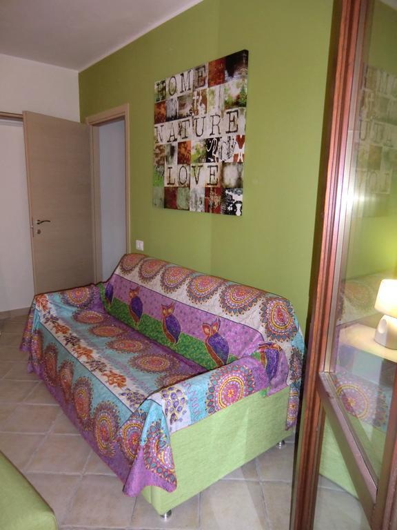 La Casa Felice Appartamenti Chia Camera foto