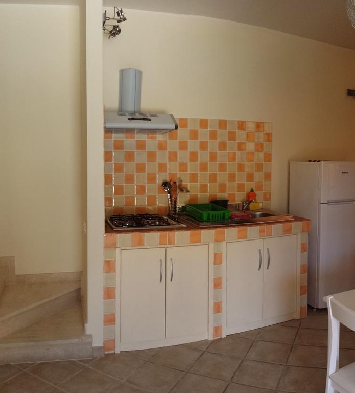 La Casa Felice Appartamenti Chia Camera foto
