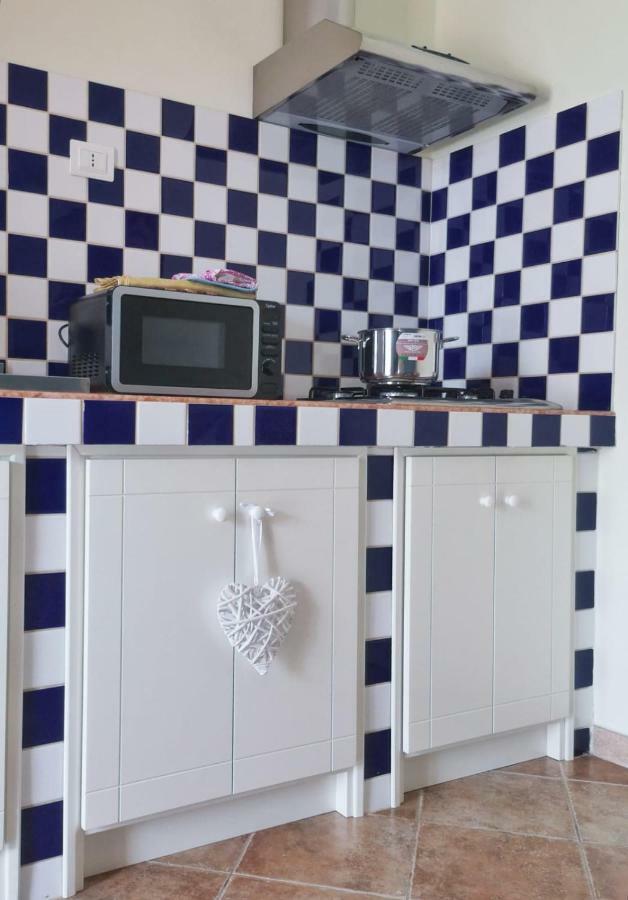 La Casa Felice Appartamenti Chia Esterno foto