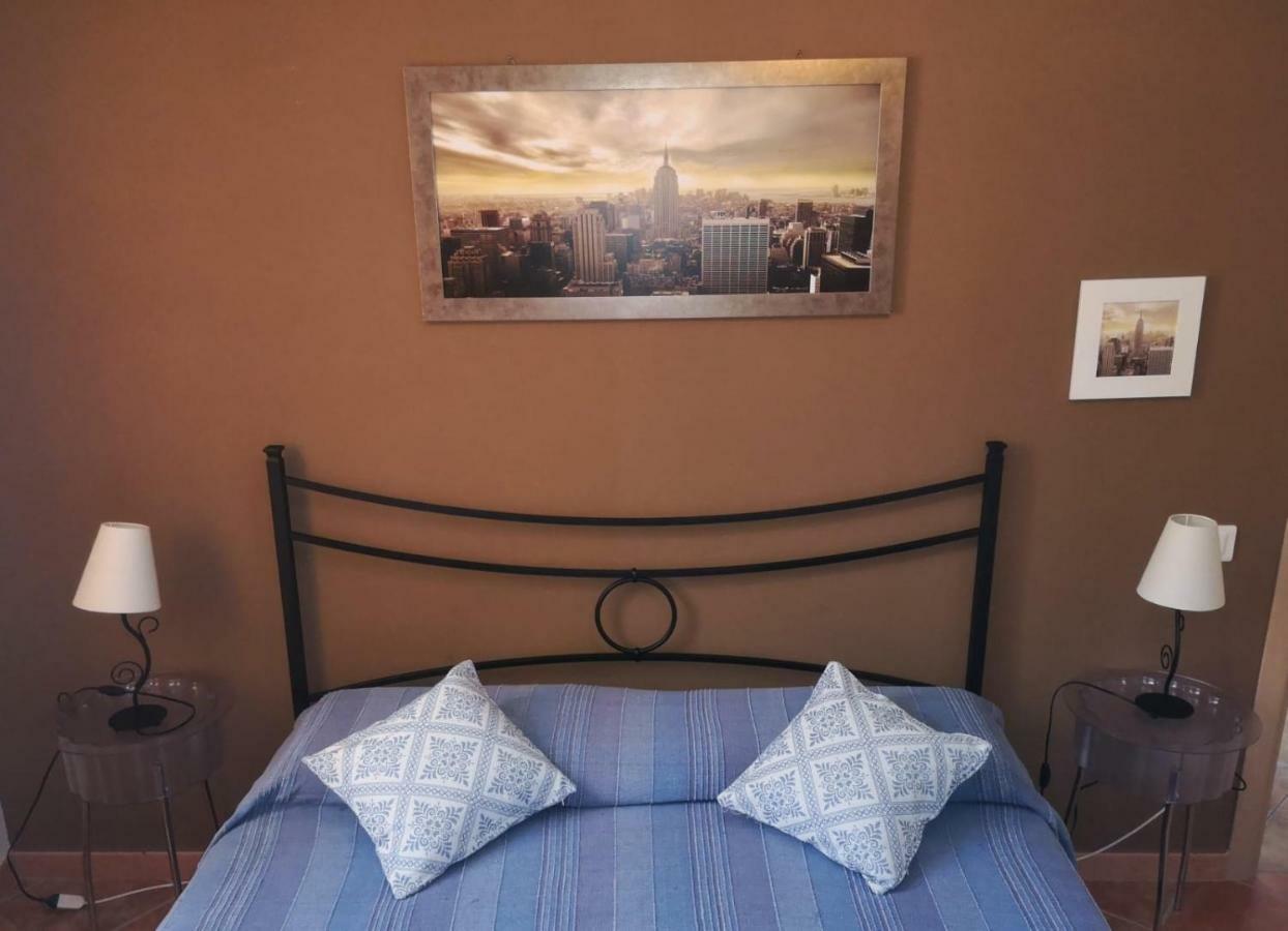 La Casa Felice Appartamenti Chia Esterno foto